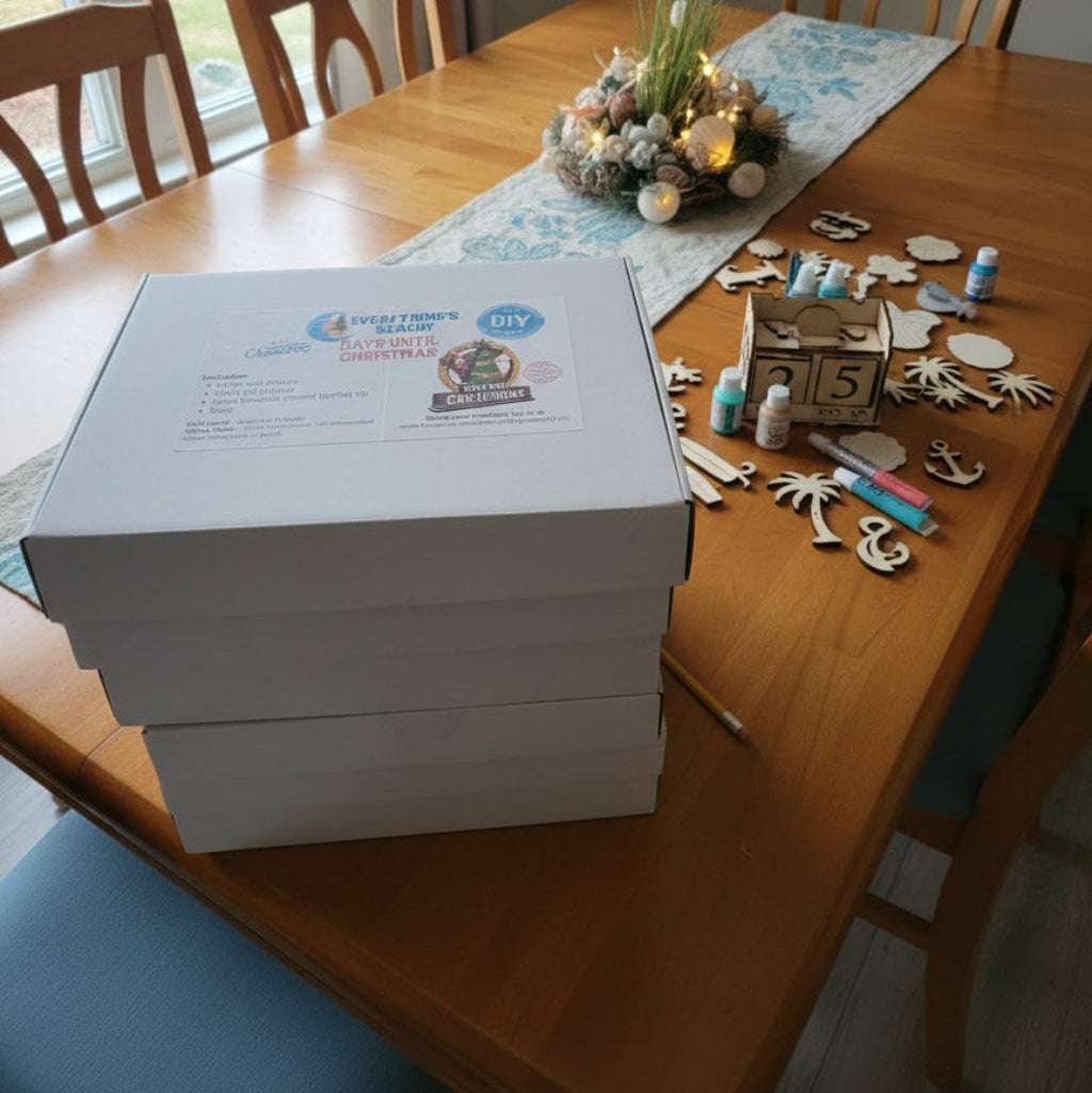 Stack of boxes on a wooden dining table with decorative items