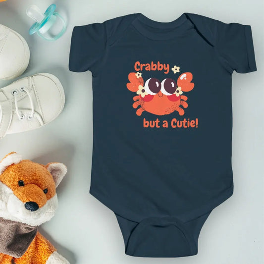 Navy short sleeved body suit with cartoon crab that says crabby but a cutie.