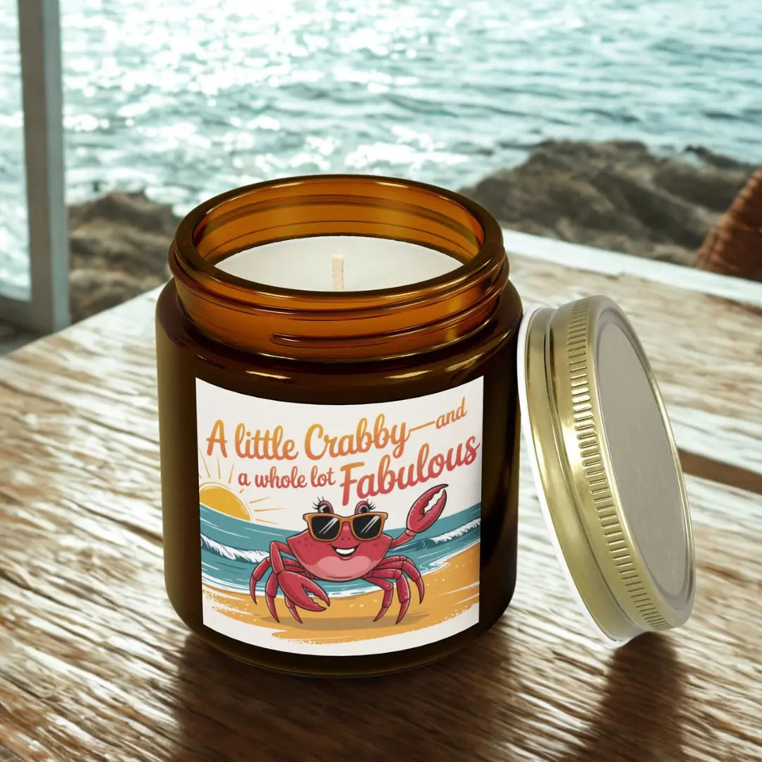 A Little Crabby and A hole Lot Fabulous 4 oz amber candle with a sexy crab wearing glasses on the beach.