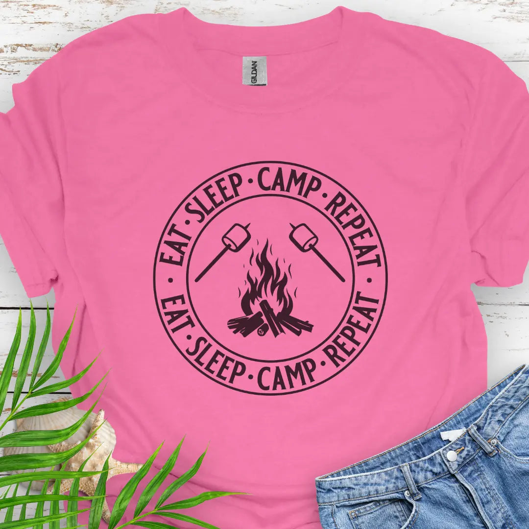 A campfire with two smore sticks that says Eat Sleep Camp Repeat in a circle around the campfire graphic in Azalea.