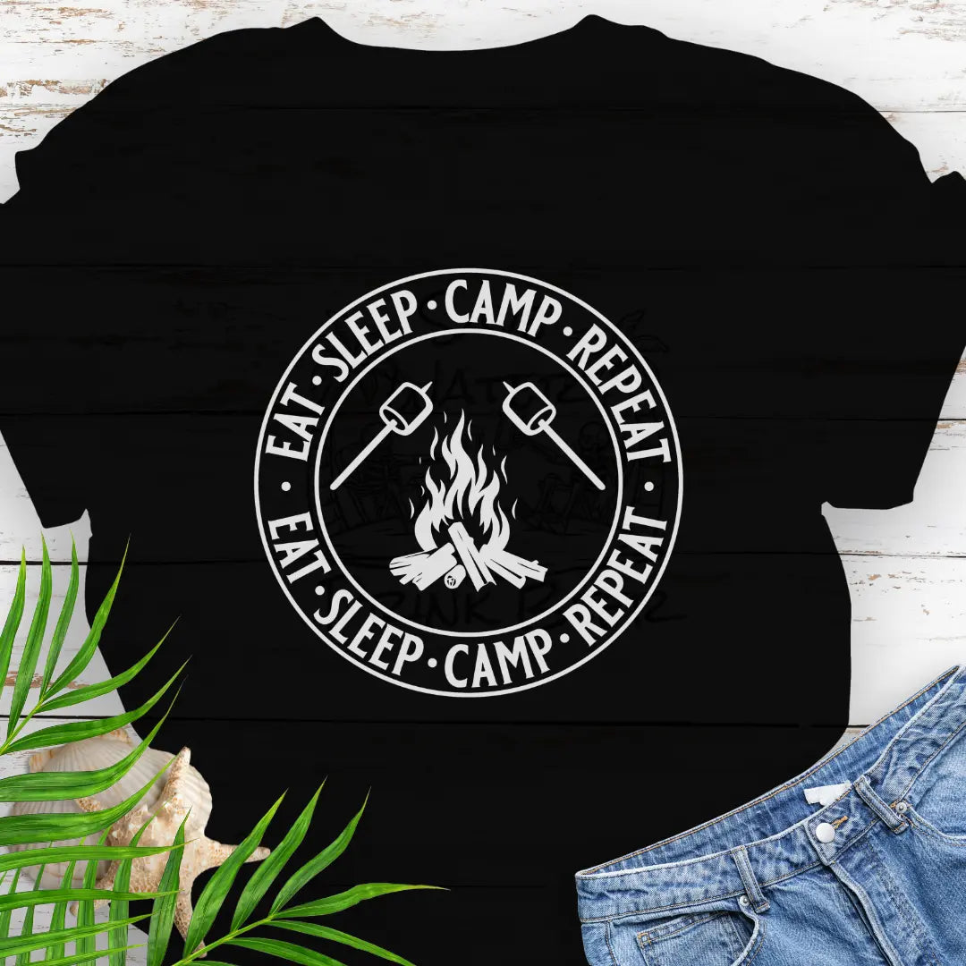 A campfire with two smore sticks that says Eat Sleep Camp Repeat in a circle around the campfire graphic in Black.