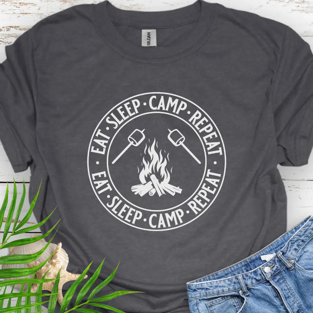 A campfire with two smore sticks that says Eat Sleep Camp Repeat in a circle around the campfire graphic in Dark Heather.