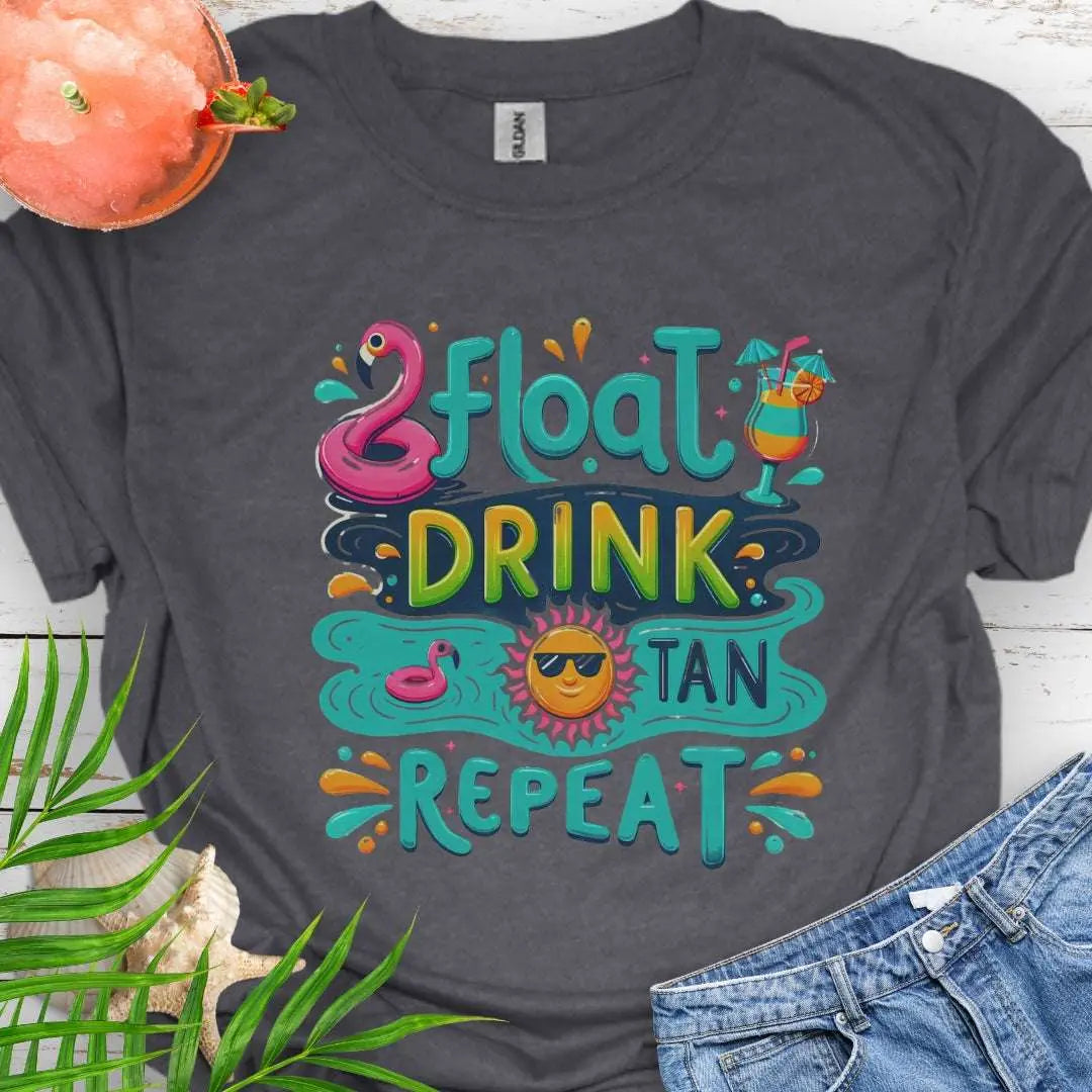 Our Float Drink Tan Repeat Dark Heather Gray T-shirt is the ultimate vibe for sun-lovers and poolside chillers! Featuring a fun and colorful design with a flamingo floaty, tropical cocktail, and a cool sun rocking shades, this tee screams vacation mode.