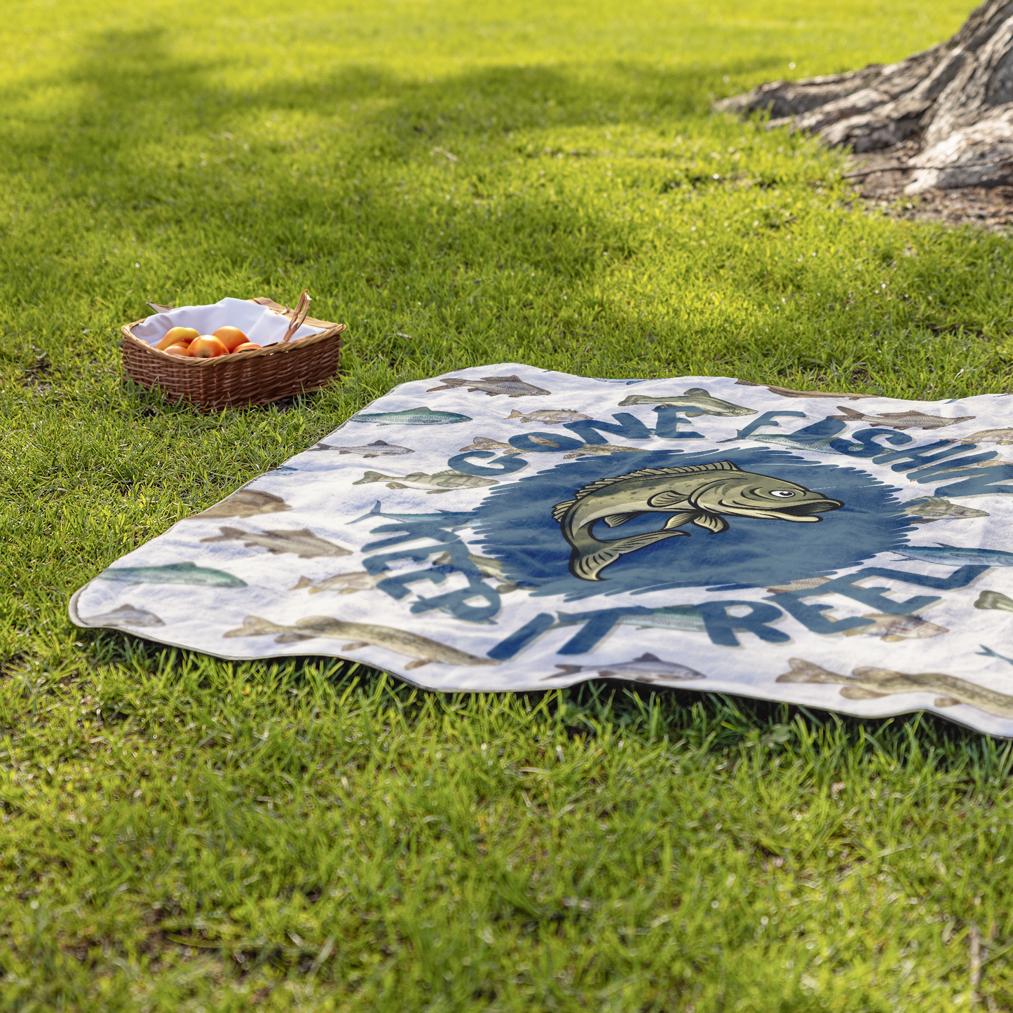 Gone_Fishing_Stay_Reel_Outdoor_Blanket_StadiumBlanket_Lifestyle_Grass_H_Mockup.png