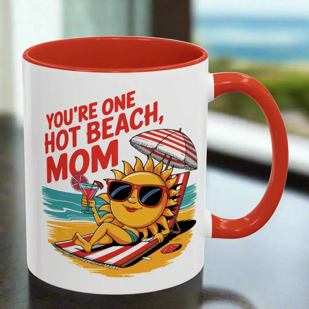 A white 11 oz mug with a red handle and inside with a sexy sun laying on a beach towel holding a drink on the beach that says You're One Hot Beach Mom.
