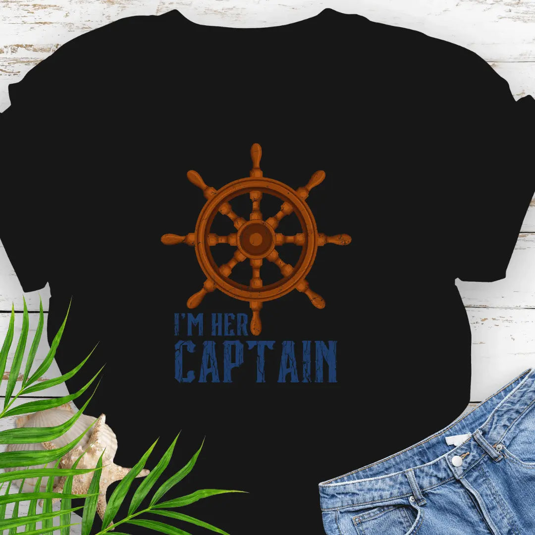 Black T-shirt featuring a bold ship wheel design and the text 'I'm Her Captain' – nautical couples apparel, beach-themed gift, coastal style t-shirt.