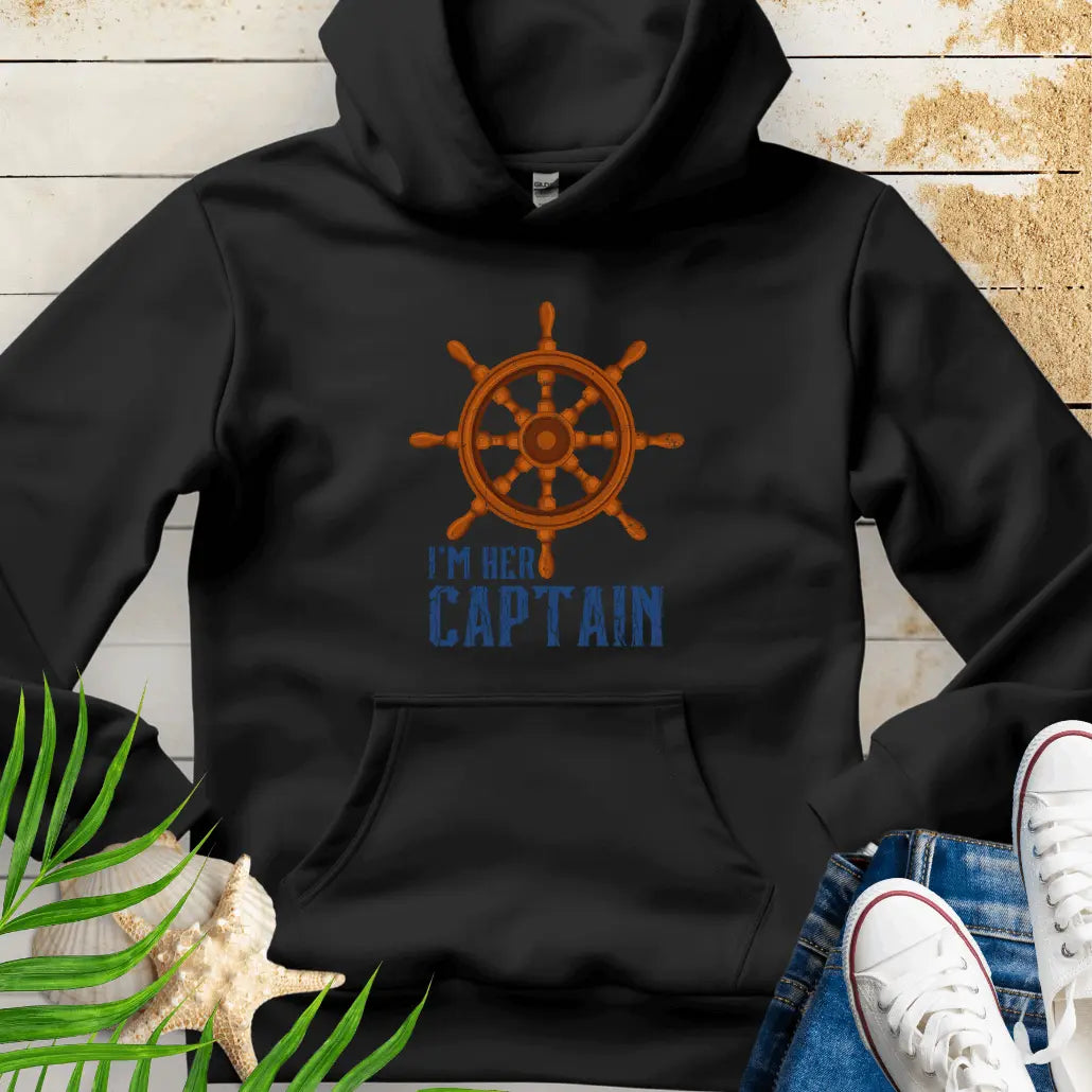 Black hoodie featuring a bold ship wheel design and the text 'I'm Her Captain' – nautical couples apparel, beach-themed gift, coastal style hoodie.
