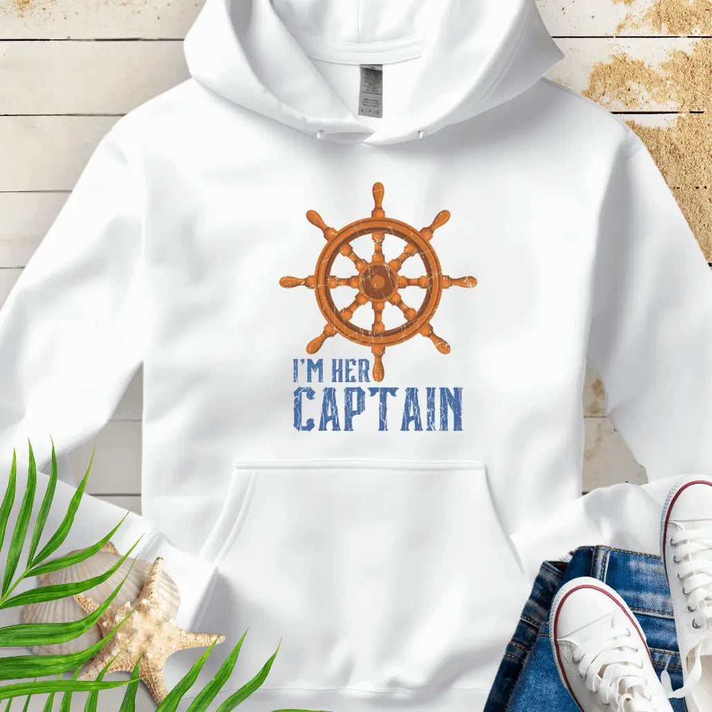 White hoodie featuring a bold ship wheel design and the text 'I'm Her Captain' – nautical couples apparel, beach-themed gift, coastal style hoodie.