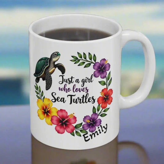 A white ceramic mug 11 0z. with a wreath of hibiscus flowers and a swimming sea turtle with text Just a girl who loves Sea Turtles and can be personalized with name.