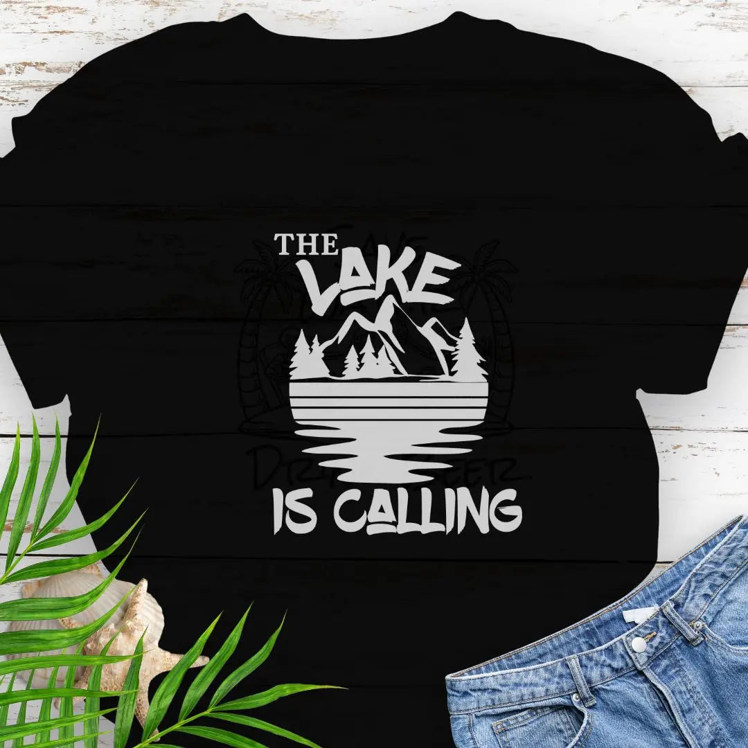 A mountain range with a lake that says The Lake is Calling in Black.