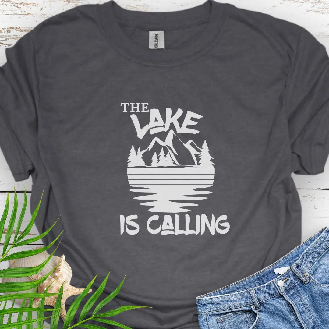 A mountain range with a lake that says The Lake is Calling in Dark Heather.