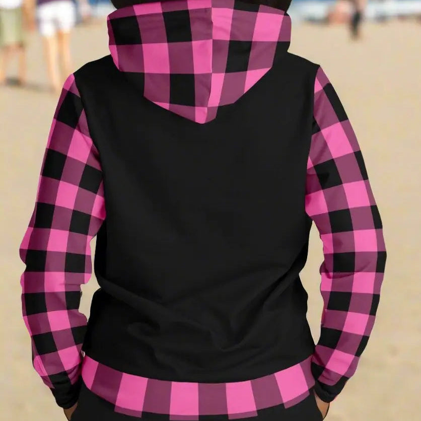Back of black hoodie with hot pink and black gingham waist, sleeves, and hood.