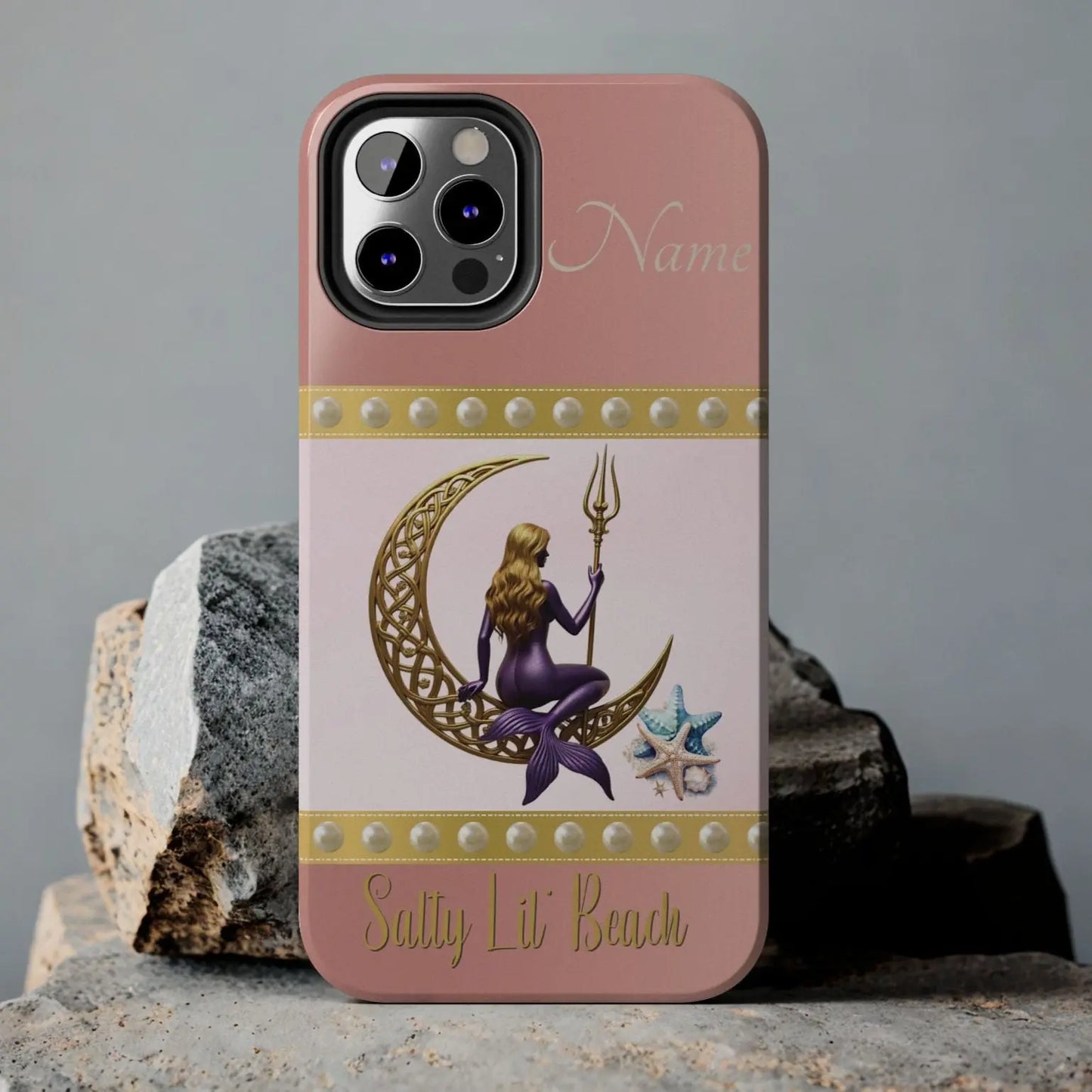 Pink and White 12 Pro iPhone Case with mermaid sitting on a celtic crescent moon holding a trident that says Salty Lil' Beach. Personalized with name.
