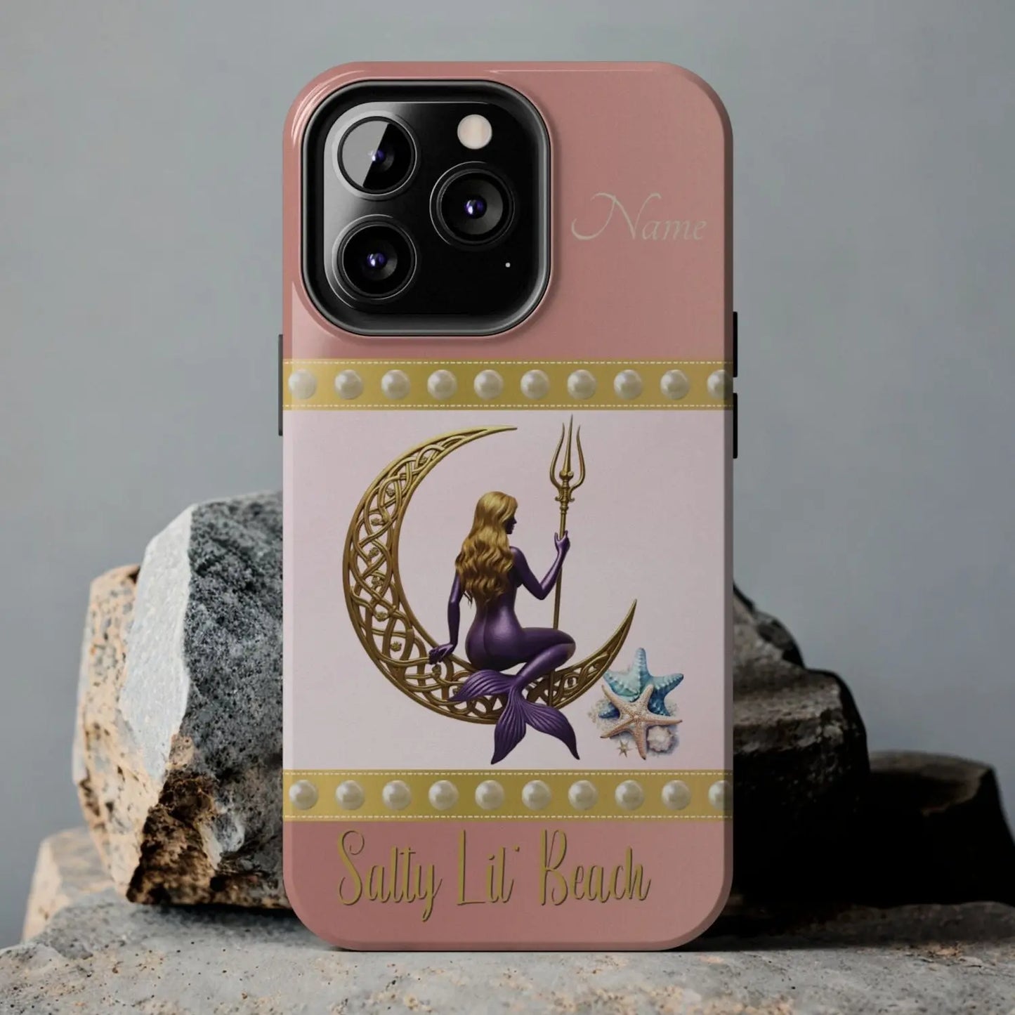 Pink and White 13 Pro iPhone Case with mermaid sitting on a celtic crescent moon holding a trident that says Salty Lil' Beach. Personalized with name.