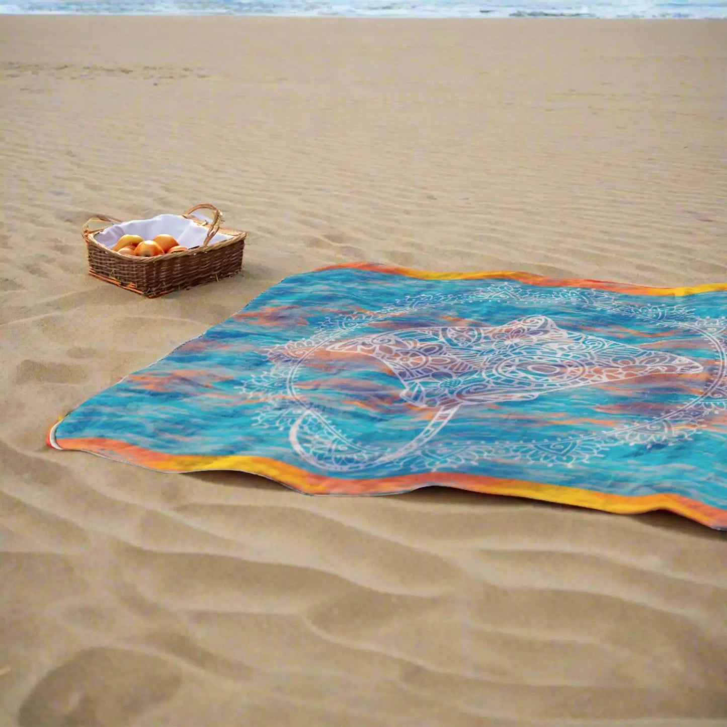 Beach Blanket with waterproof black back and blue and orange gradient background with celtic style Stingray