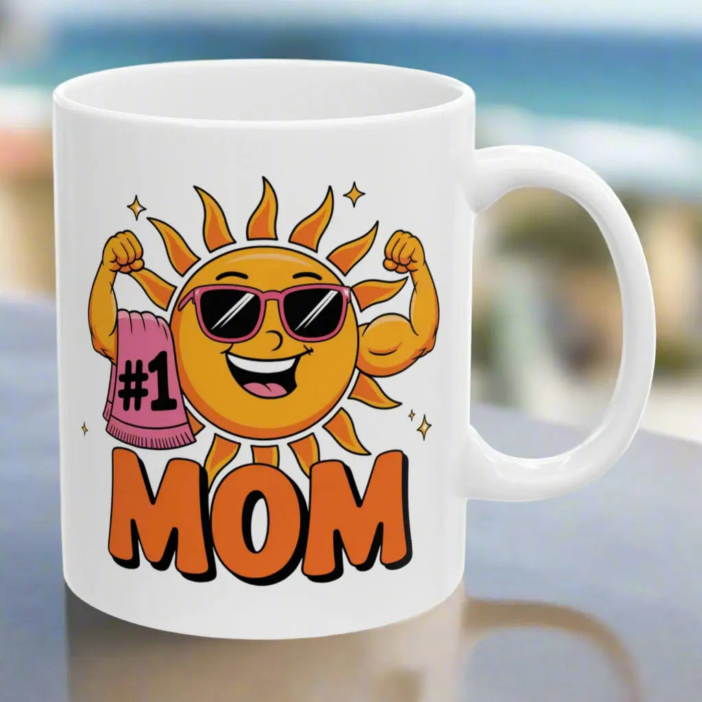 A white 11 oz mug with a muscle woman sun wearing sunglasses holding a beach towel over her arm that says #1 Mom.
