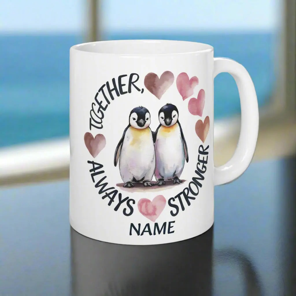 White 11 oz ceramic mug featuring two adorable penguins with hearts and the phrase 'Always Stronger Together.' A perfect gift for couples, friends, or family, this durable and microwave-safe mug is ideal for coffee, tea, or hot cocoa."
