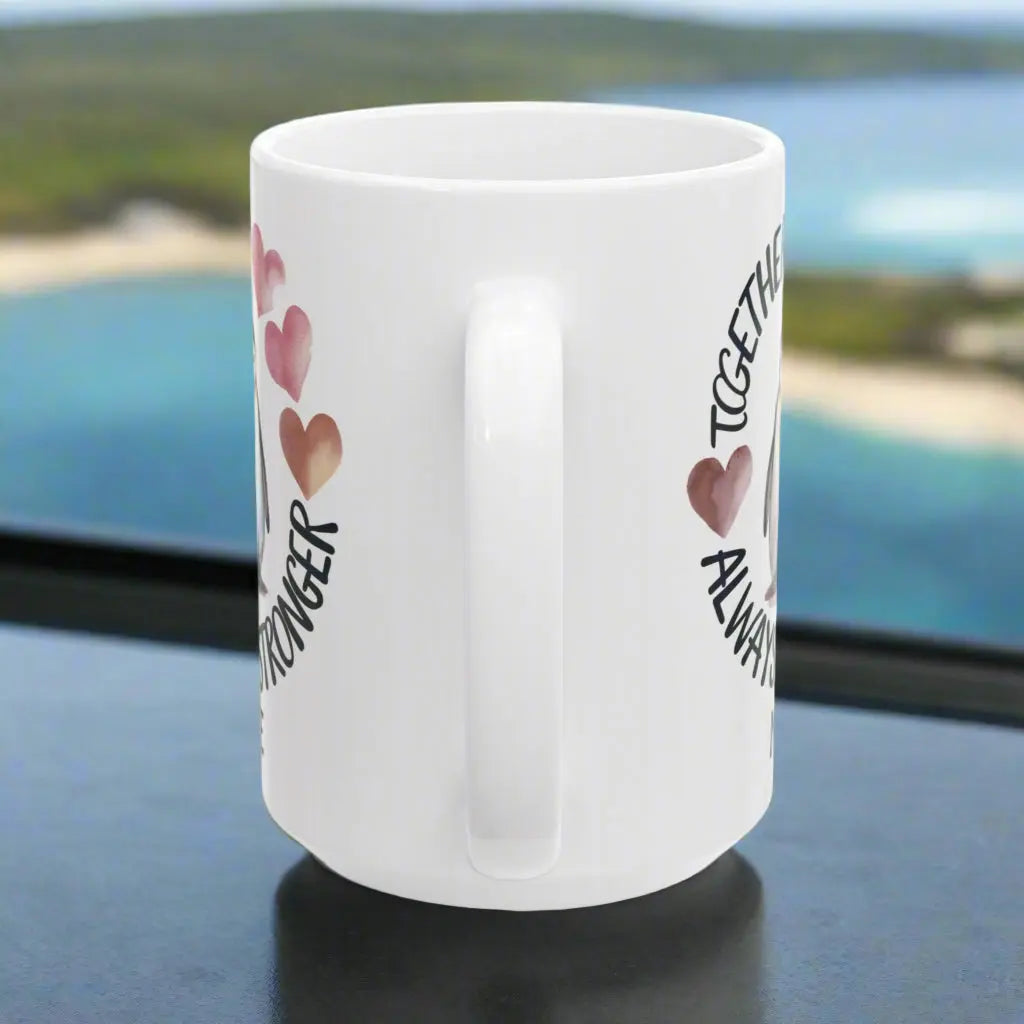 Side view of White 15 oz ceramic mug featuring two adorable penguins with hearts and the phrase 'Always Stronger Together.' A perfect gift for couples, friends, or family, this durable and microwave-safe mug is ideal for coffee, tea, or hot cocoa."