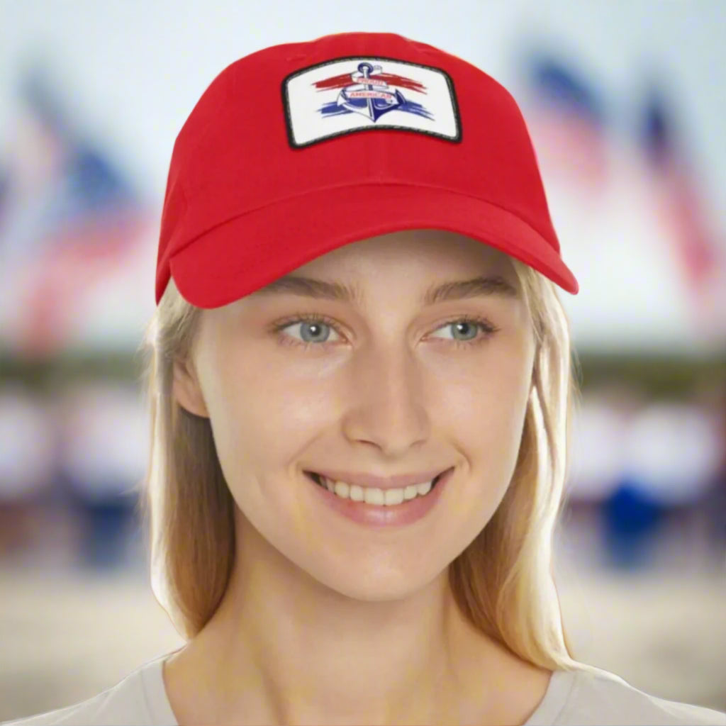 Red Curved-bill hat with leather patch featuring an anchor design and the words “Proud American,” perfect for patriotic celebrations and everyday wear.