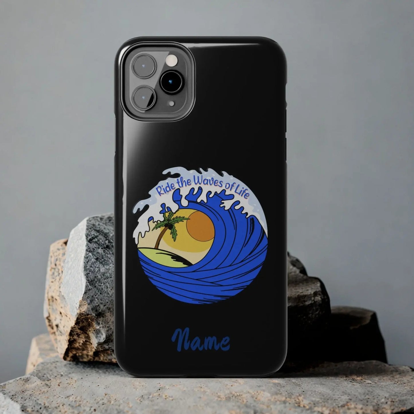 Black iPhone 11 Pro Max Case with wave with sun and palm tree in the middle that says Ride the Waves of Life.