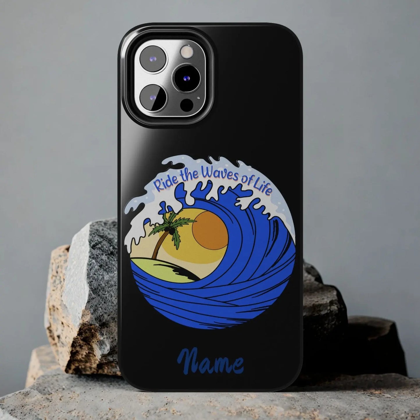 Black iPhone 12 Pro Case with wave with sun and palm tree in the middle that says Ride the Waves of Life.