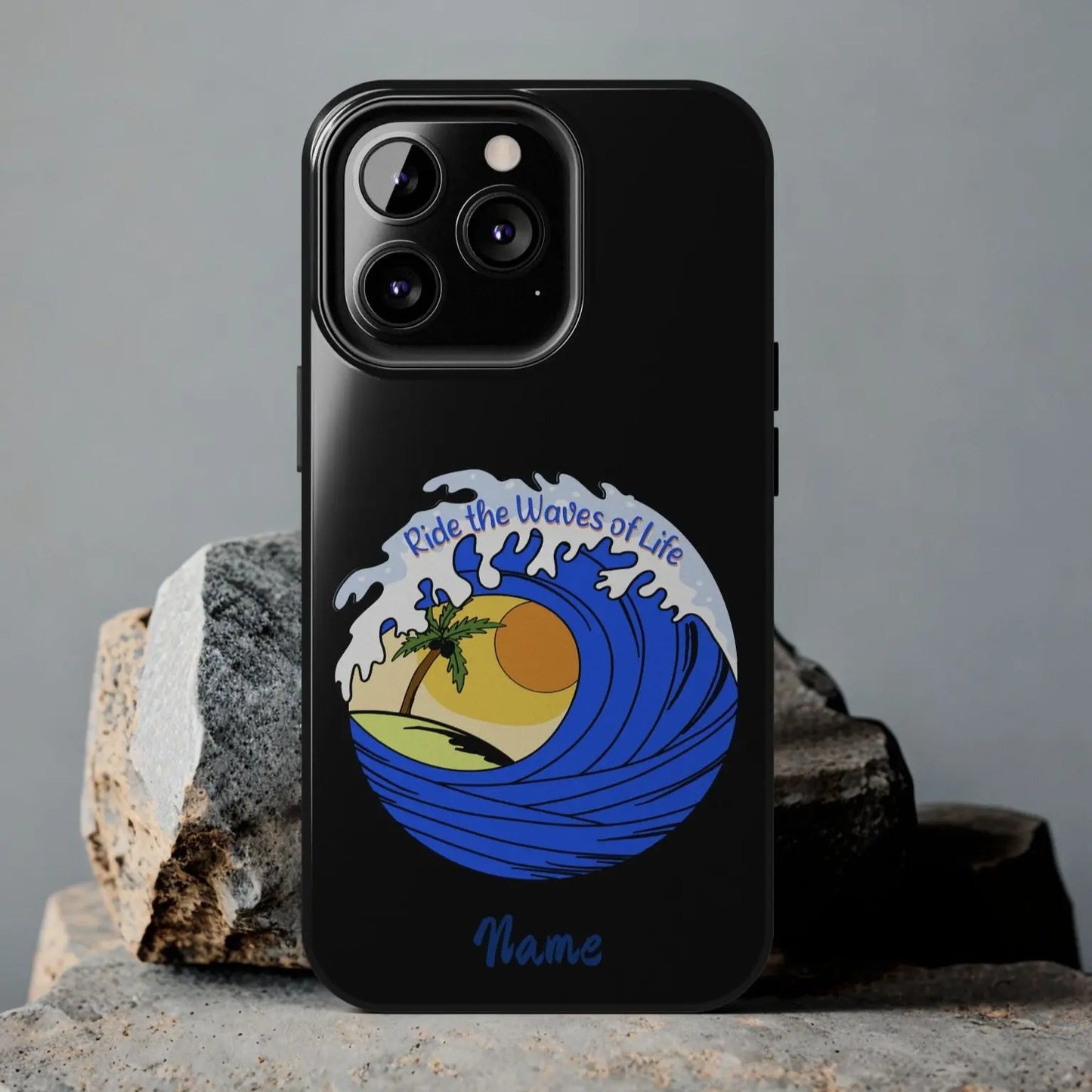 Black iPhone 13 Pro Case with wave with sun and palm tree in the middle that says Ride the Waves of Life.
