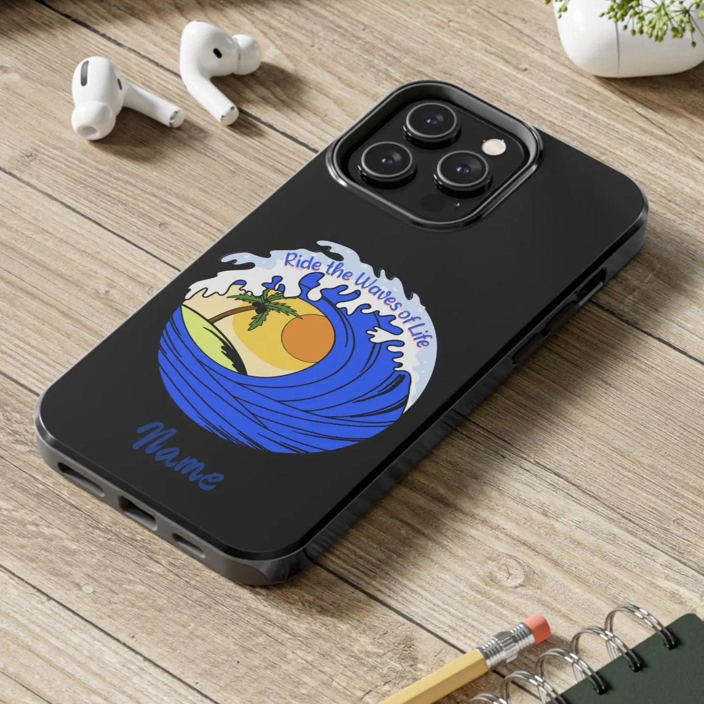 Black iPhone 14 Plus Case with wave with sun and palm tree in the middle that says Ride the Waves of Life.