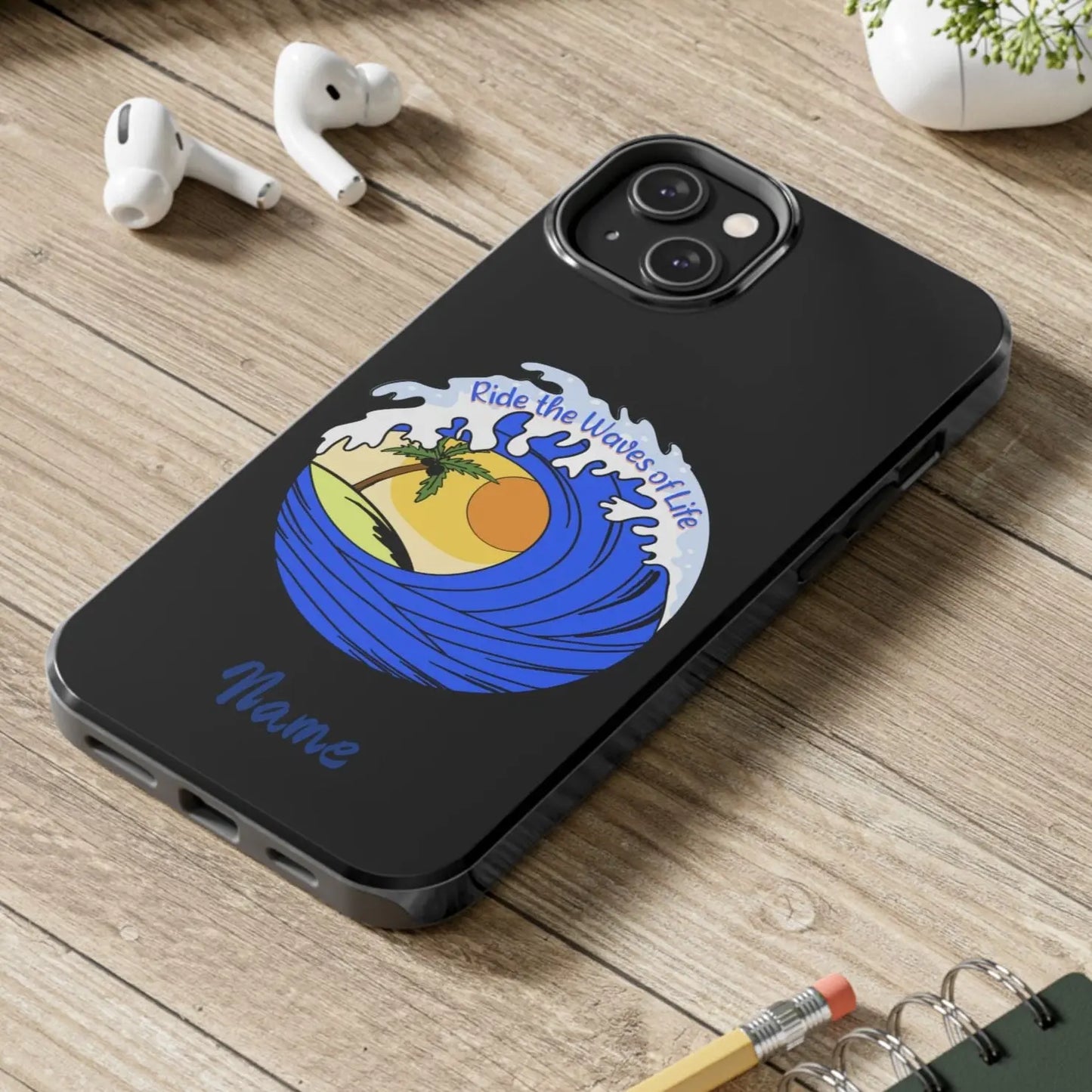 Black iPhone 14 Pro Max Case with wave with sun and palm tree in the middle that says Ride the Waves of Life.