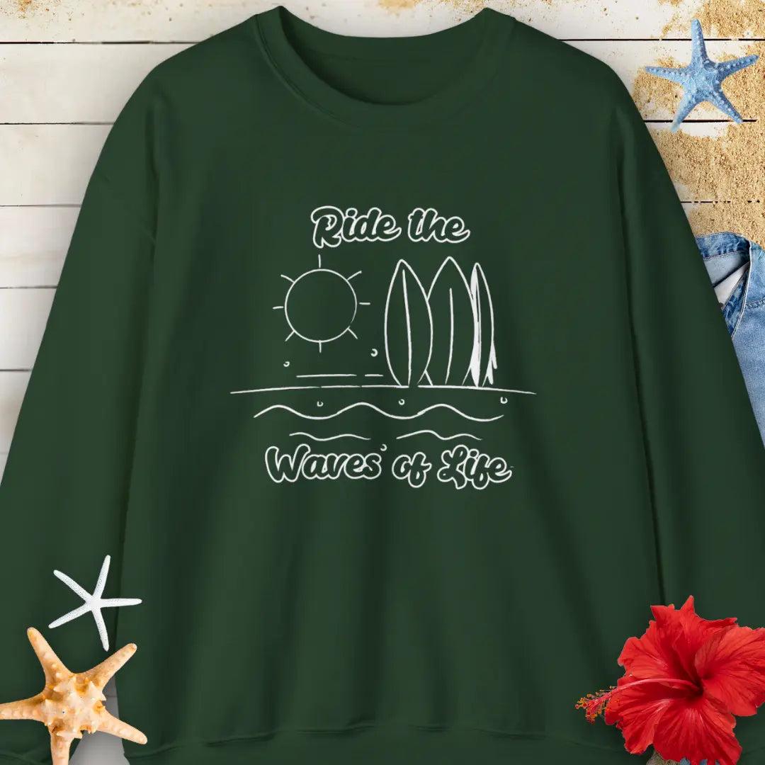 Our Ride the Waves of Life Sweatshirt in Forest Green with Surfboards and the sun line art with the phrase ide the Waves of Life. Perfect for any surfing enthusiast.