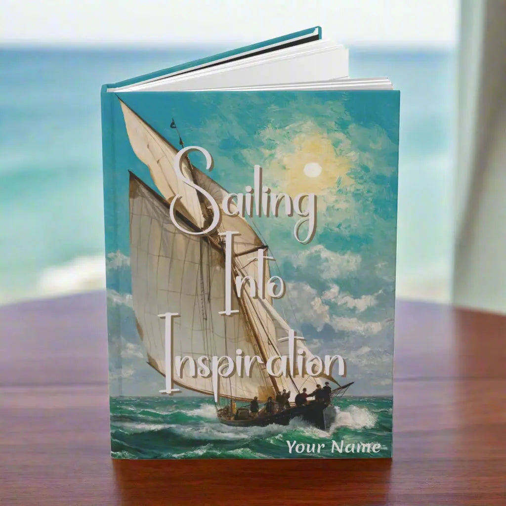 Our Hardcover 150 lined-page Journal featuring a timeless sailboat navigating rolling waves under a dramatic sky. With the inspiring slogan "Sailing Into Inspiration".