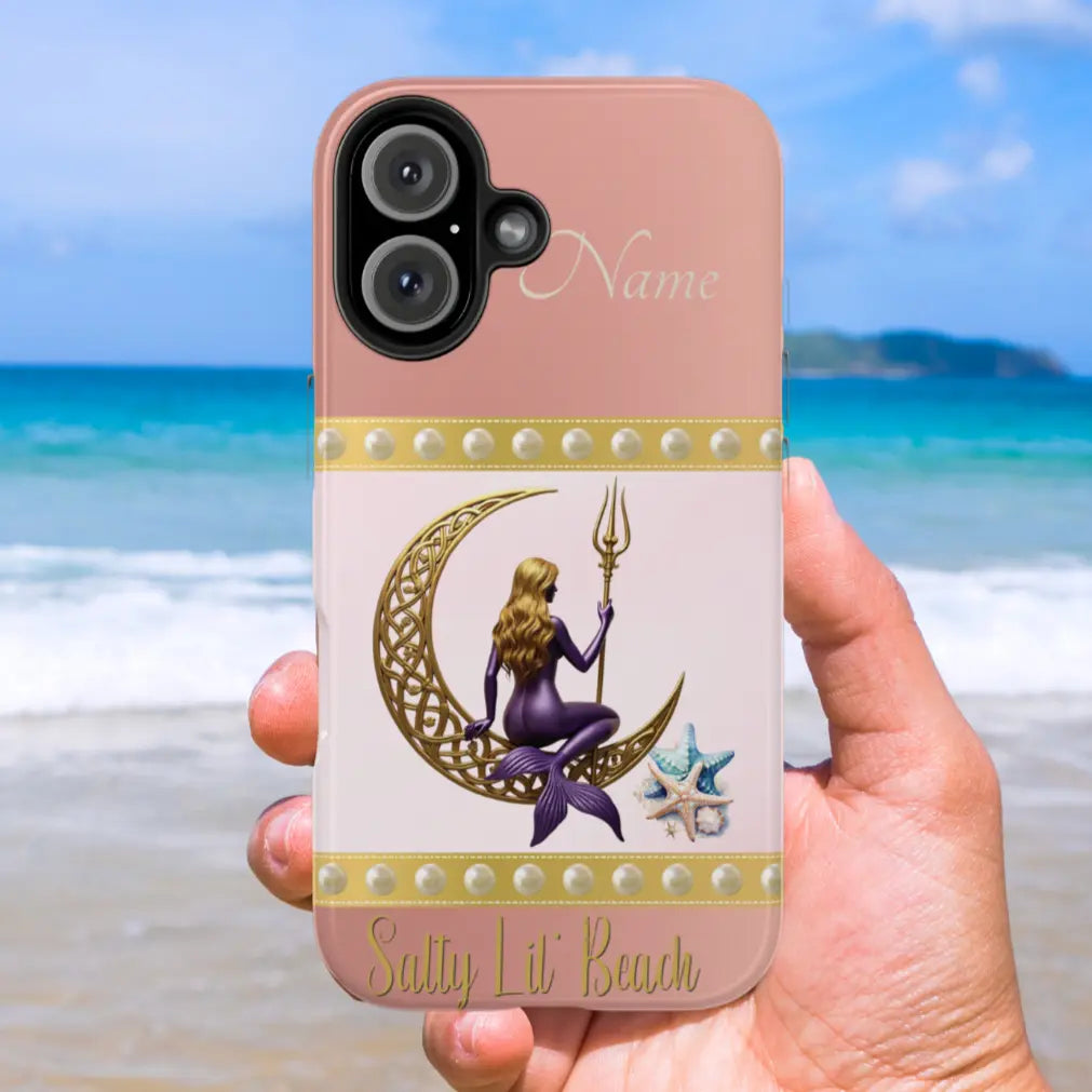 Pink and White iPhone 16 Cell Phone Case with mermaid sitting on a celtic crescent moon holding a trident that says Salty Lil' Beach. Personalized with name.