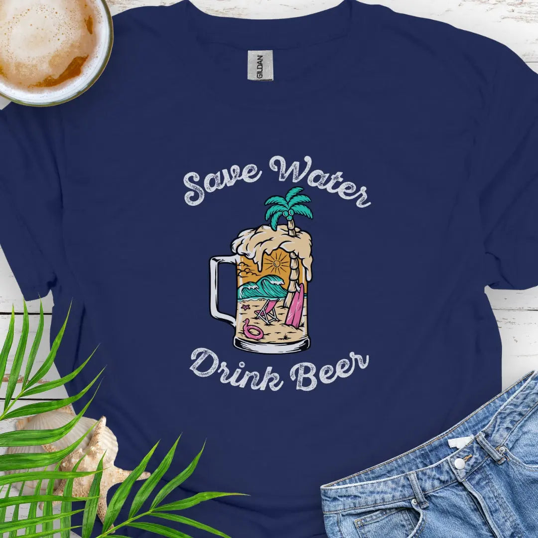 Navy T-shirt with beer mug filled with an overpour of a beach scene with the text Save Water Drink Beer. Perfect happy hour or party shirt!