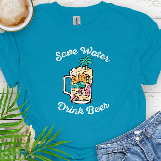 Tropical Blue T-shirt with beer mug filled with an overpour of a beach scene with the text Save Water Drink Beer. Perfect happy hour or party shirt!