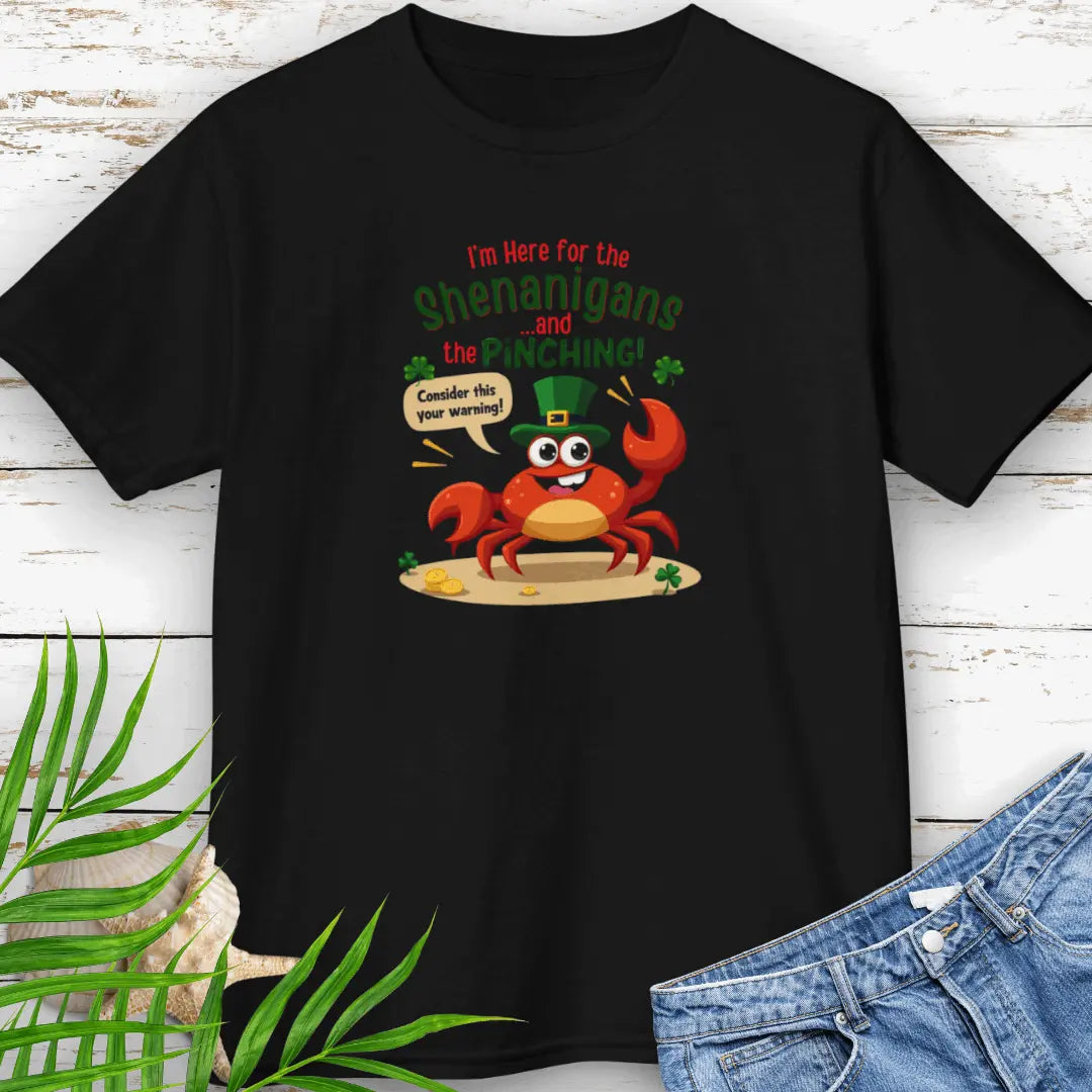 I'm Here for the Shenanigan's and the Pinching Black Child T-shirt with a cartoon crab wearing an Irish top hat sitting on the beach holding a sign that says consider this your warning.