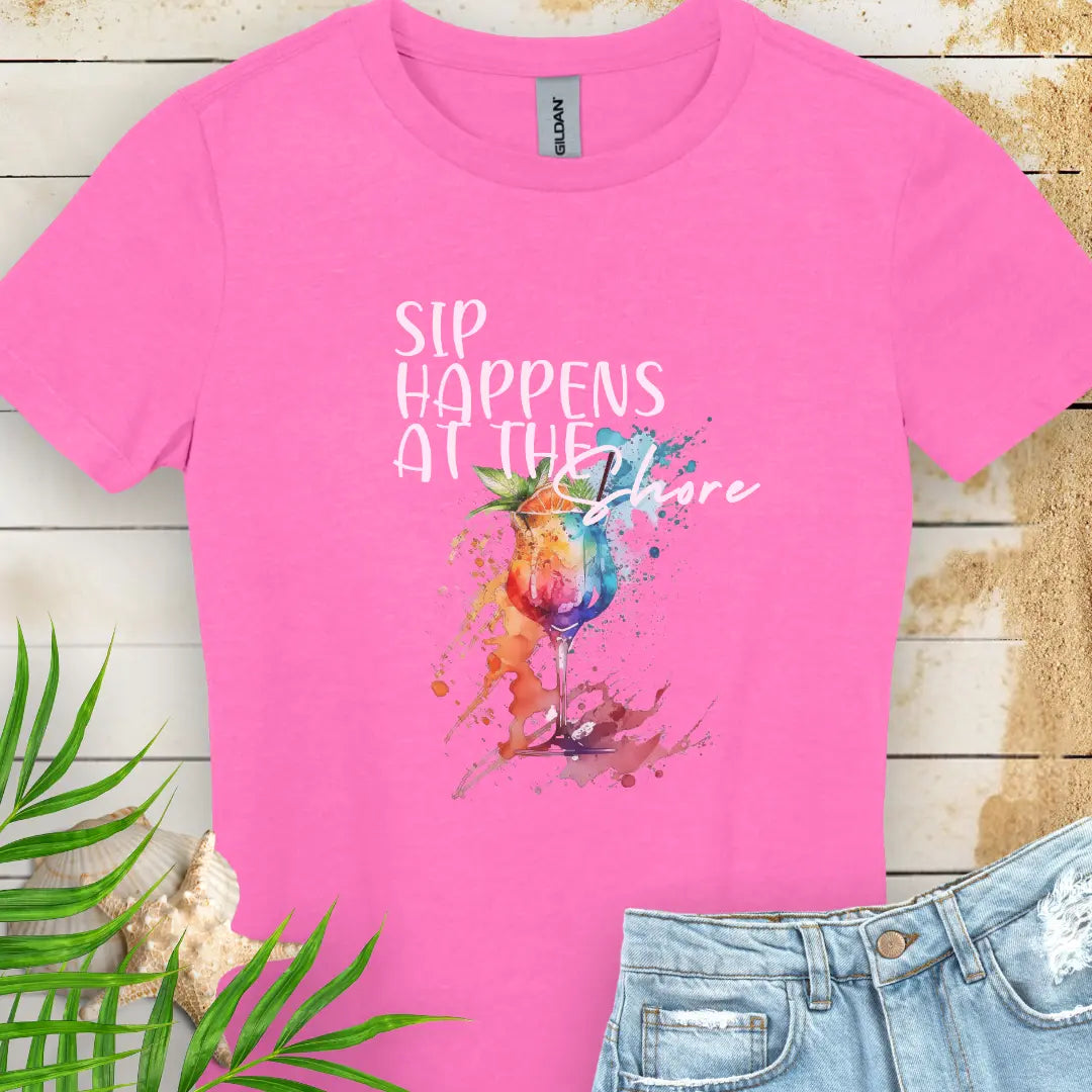 Azalea women's t-shirt with a colorful cocktail graphic and text Sips Happen at the Shore.