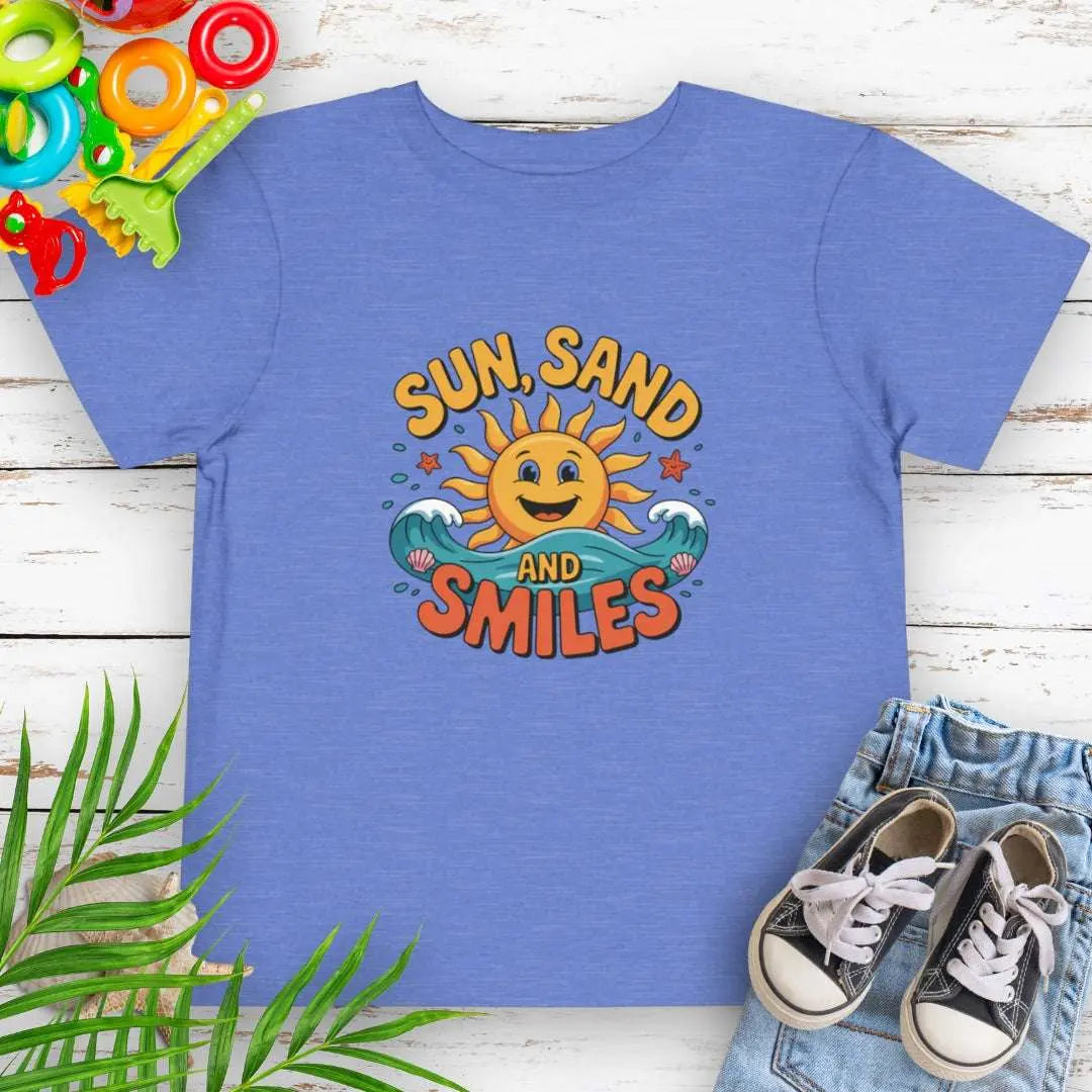 Heather Columbia Blue Toddler T-shirt with a smiling sun and waves that says Sun, Sand and Smiles.