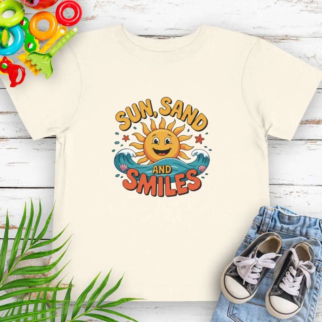 Natural Toddler T-shirt with a smiling sun and waves that says Sun, Sand and Smiles.