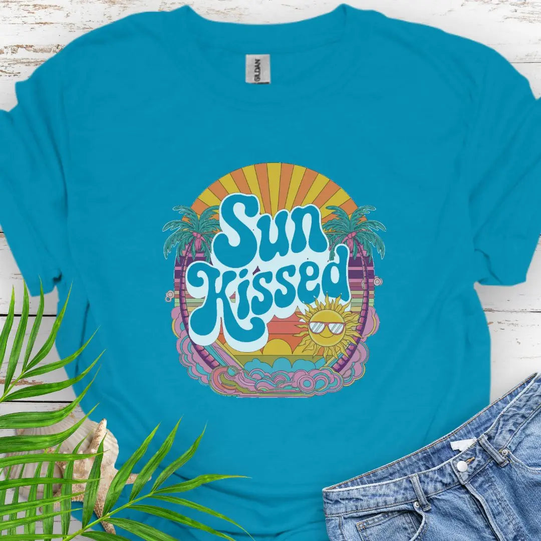 A retro beach scene with fun Sunkissed text in Tropical Blue.