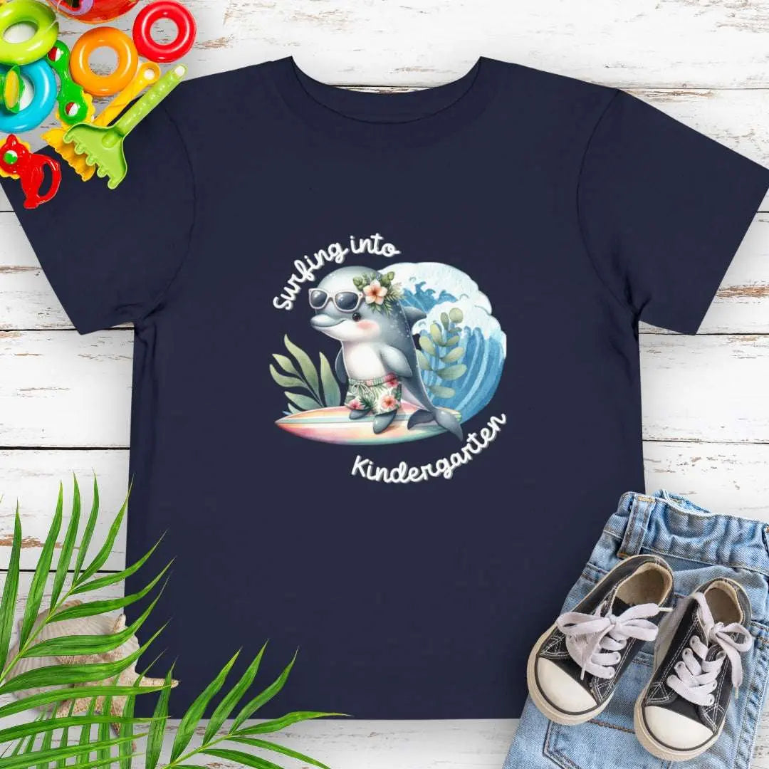 Surfing Into Kindergarten Black Heather Mauve Toddler's T-shirt with a fun dolphin surfing.