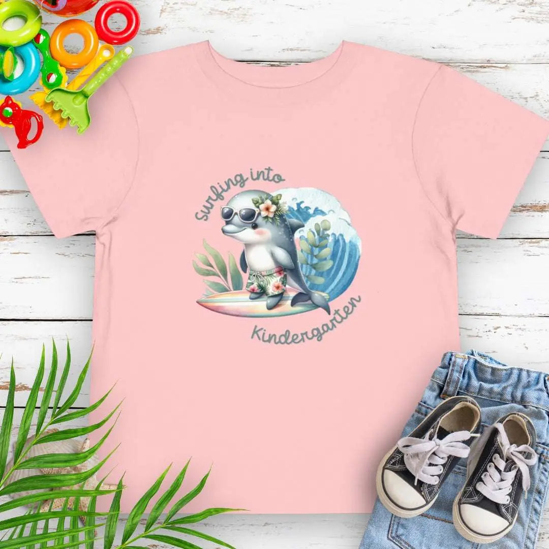 Surfing Into Kindergarten Pink Toddler's T-shirt with a fun dolphin surfing.