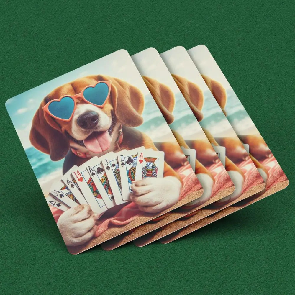 Playing cards with a beagle in heart glasses holding playing cards while laying on a beach