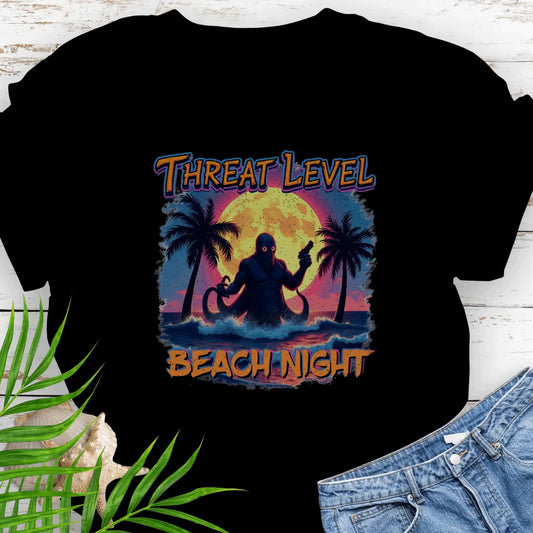Black T-shirt with the words Threat Level Beach Night and an octopus villain coming out of the ocean with a bright moon background in a retro 80's movie poster vibe.
