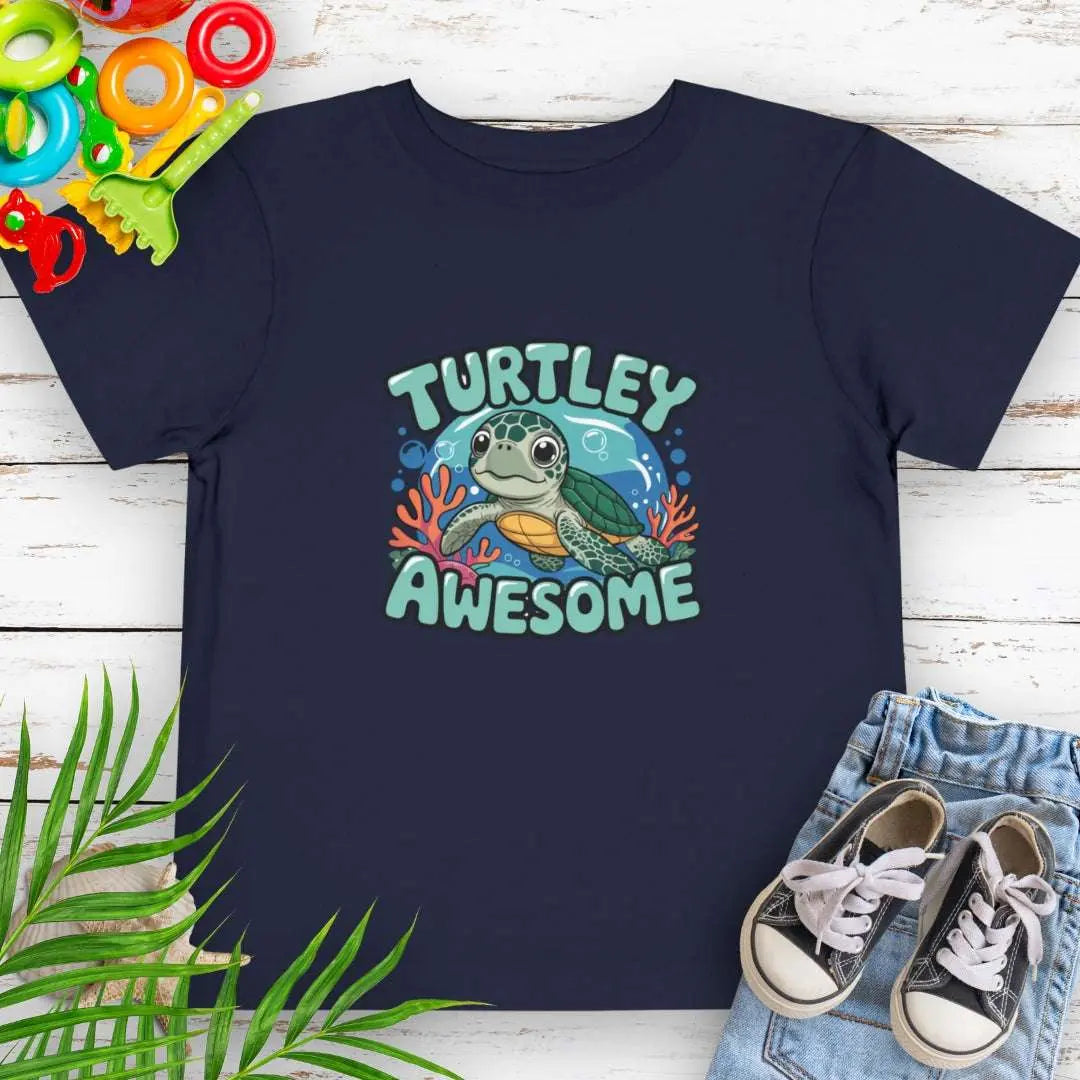 Turtley Awesome Toddler's Navy T-shirt with cartoon sea turtle underwater.