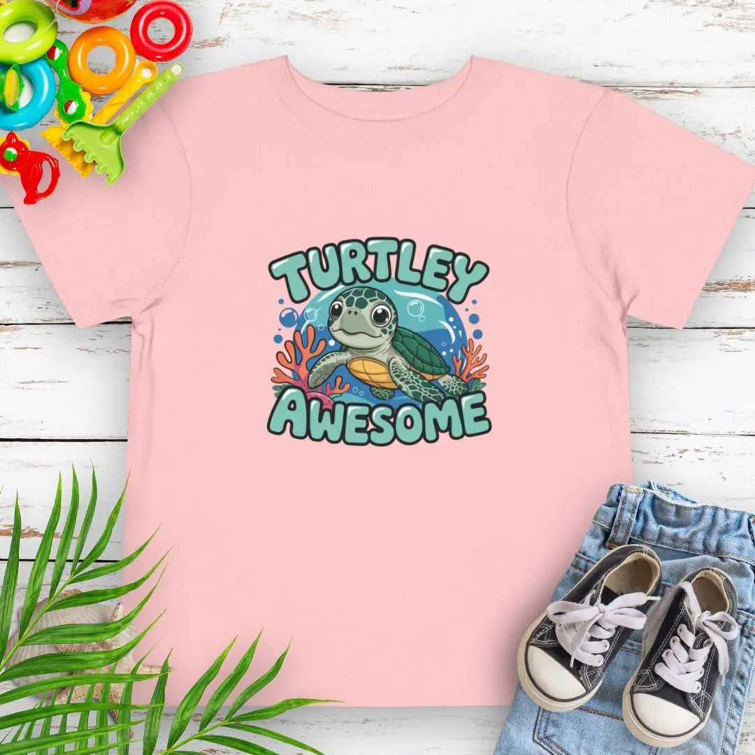 Turtley Awesome Toddler's Pink T-shirt with cartoon sea turtle underwater.