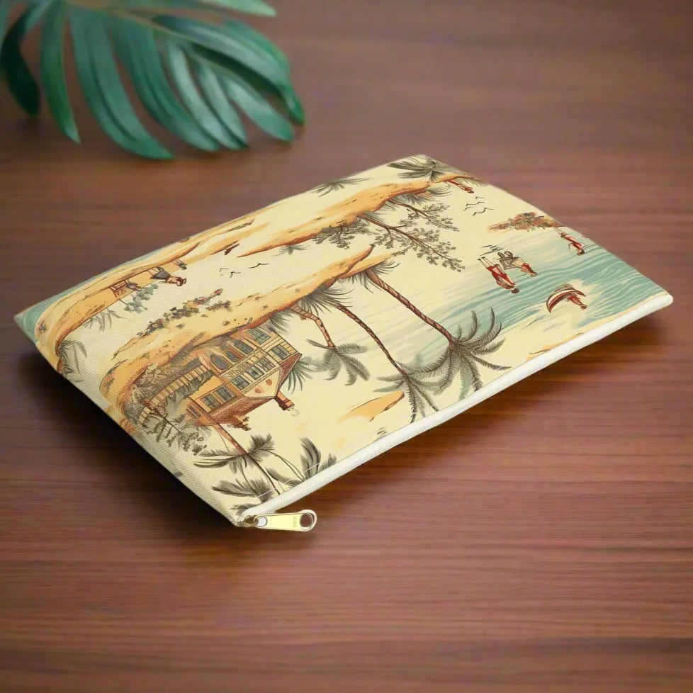 Our Vintage Beach Accessory Pouch constructed from a durable material with a zipper closure featuring a vintage beach scene. Available in small or large.