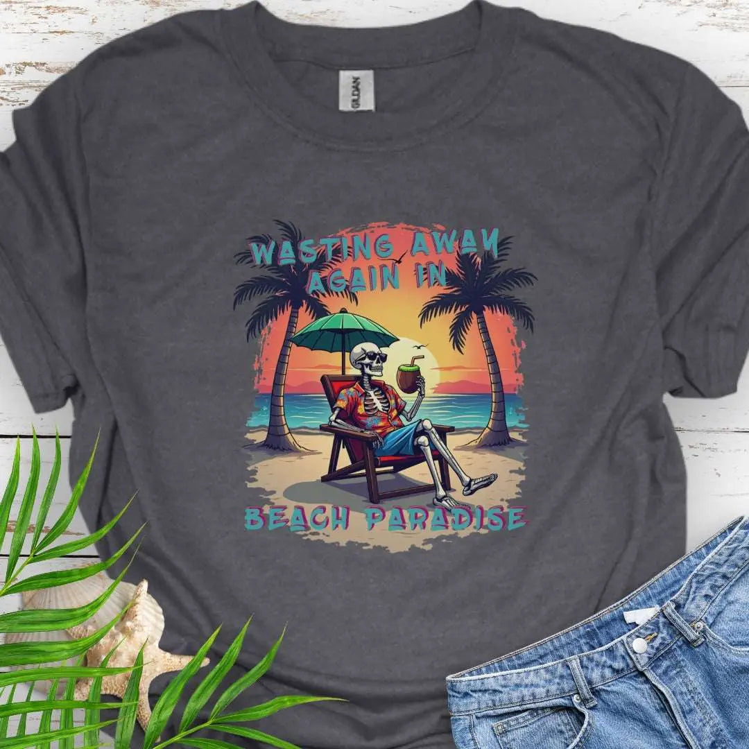 A Dark Heather T-shirt with a skeleton in a Hawaiian Shirt sitting under a beach umbrella on the beach at sunset with a coconut drink between two palm trees that says Wasting Away in Beach Paradise.