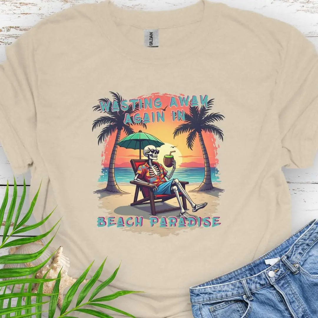 A Natural T-shirt with a skeleton in a Hawaiian Shirt sitting under a beach umbrella on the beach at sunset with a coconut drink between two palm trees that says Wasting Away in Beach Paradise.