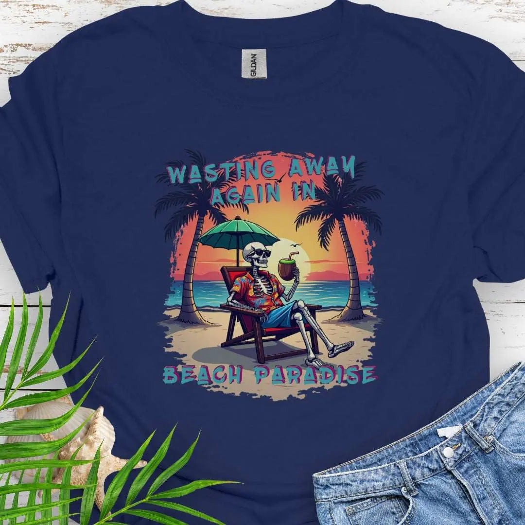 A Navy T-shirt with a skeleton in a Hawaiian Shirt sitting under a beach umbrella on the beach at sunset with a coconut drink between two palm trees that says Wasting Away in Beach Paradise.