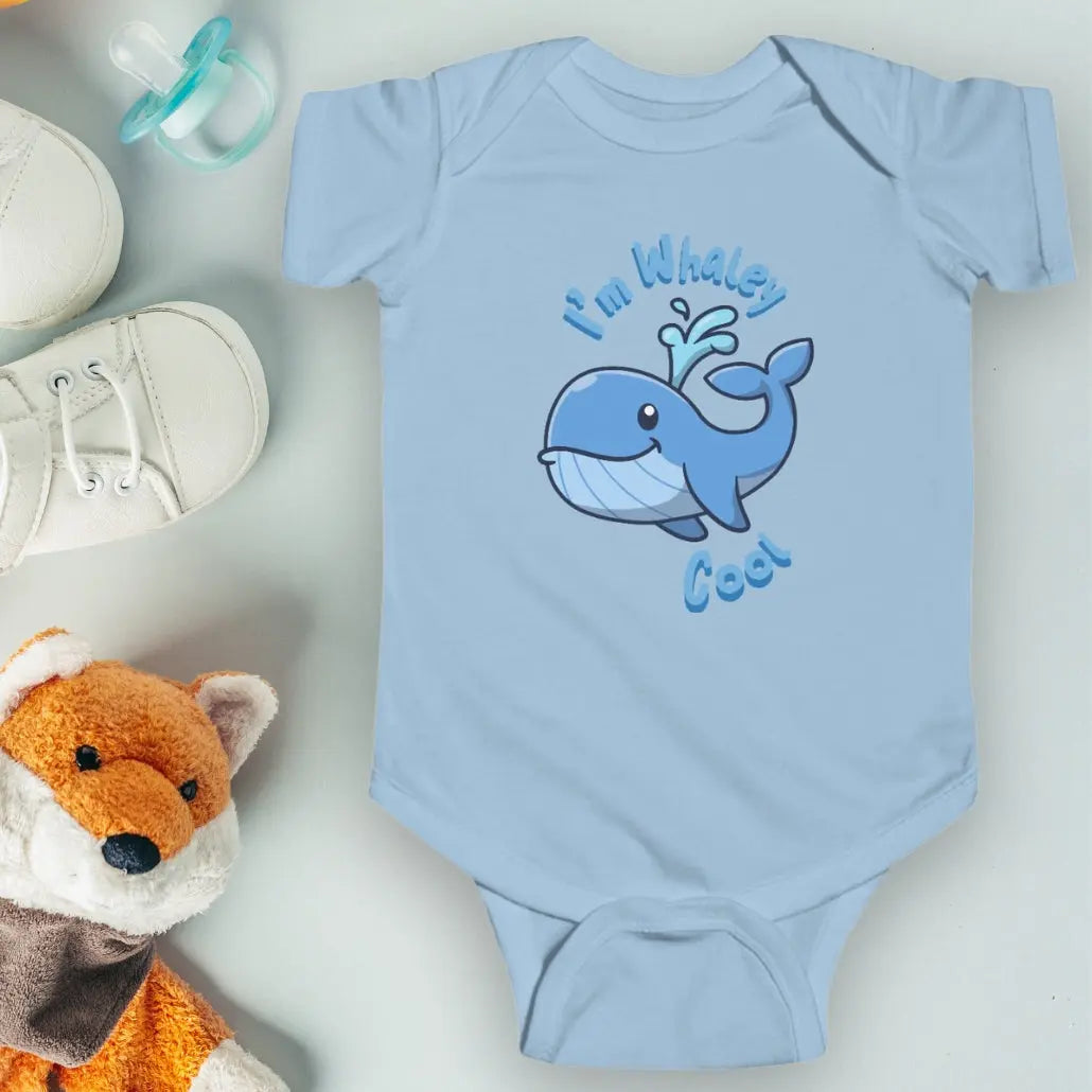 Light Blue infant one-piece bodysuit with a cartoon whale that says I'm Whaley Cool.