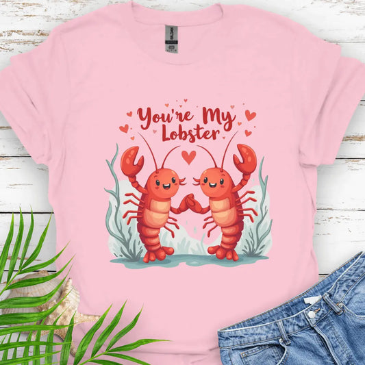Pink Softstyle unisex T-shirt featuring two lobsters holding hands with the text 'You're My Lobster' – a fun and quirky design for couples or lobster lovers.